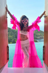 Vibrant pink festival outfit with ruffled kimono & lace pants by HARMONIA NY, perfect for Coachella or Burning Man