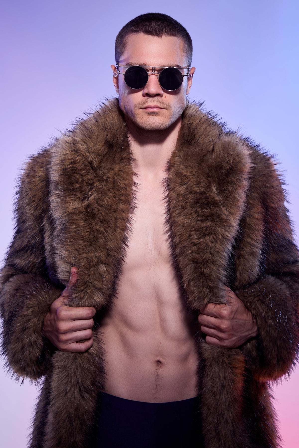 Bold festival wear: man in faux fur coat & sunglasses, HARMONIA NY style