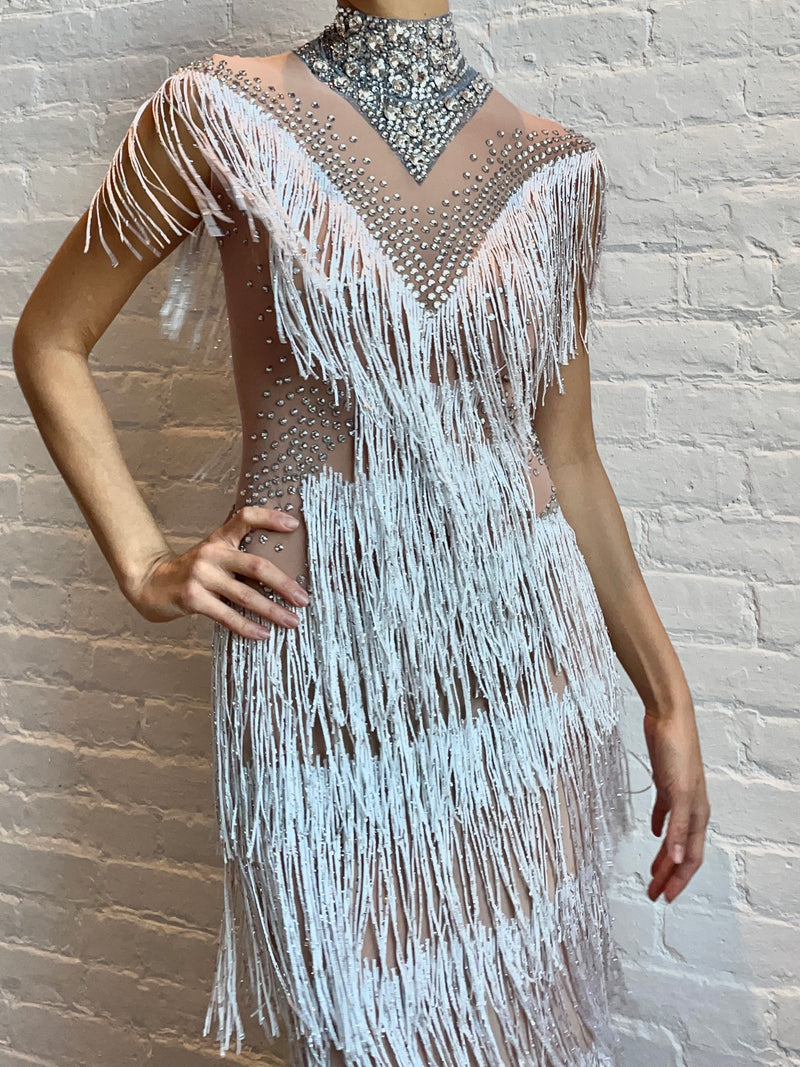 Sparkling silver fringe dress with crystal embellishments, perfect for festivals or stage wear at HARMONIA NY.